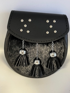 02-151 Semi-dress sporran with embossed/studded flap and black sealskin 
